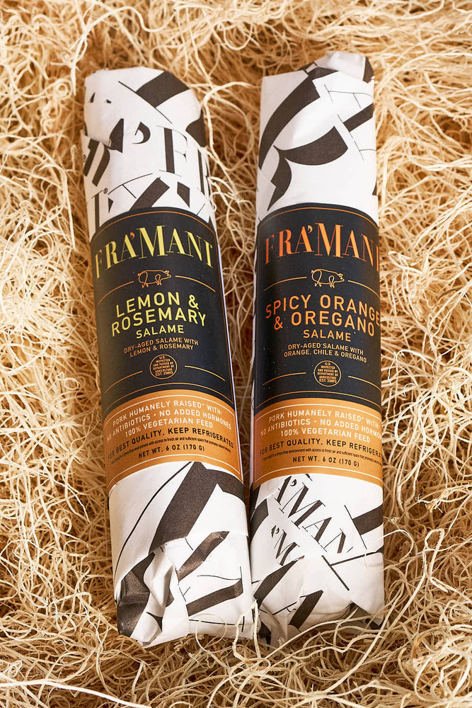 Fra' Mani Lemon & Rosemary and Orange & Oregano Salami. Part of a gourmet gift box and perfect for salumi and charcuterie boards and gifts for foodies