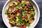 BRUSSELS WITH ITALIAN SAUSAGE AND PICKLED ONIONS