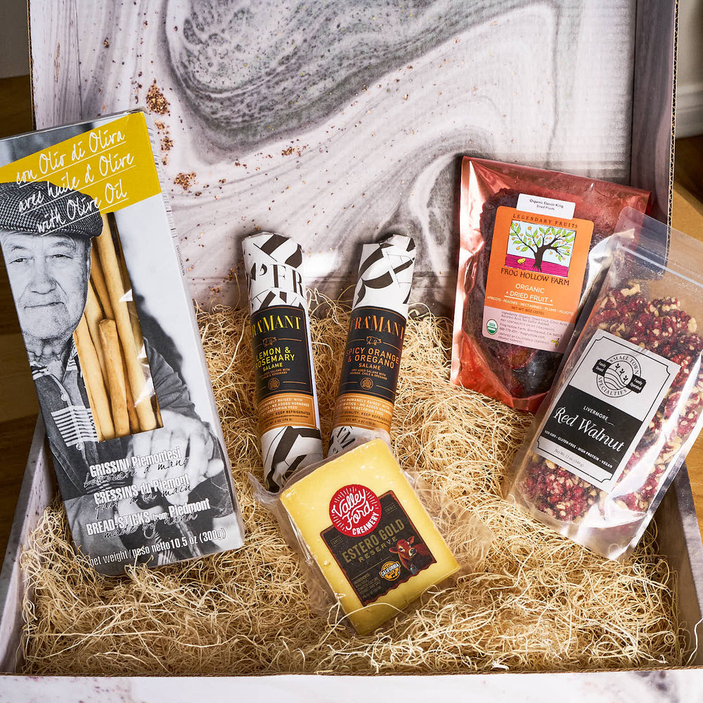 A gourmet gift box that is perfect for salumi and charcuterie boards and gifts for foodies