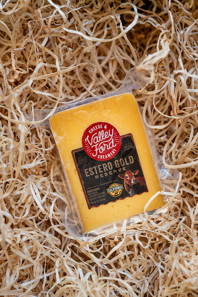 
                  
                    Valley Ford Estero Gold Reserve Cheese. Part of a gourmet gift box and perfect for salumi and charcuterie boards and gifts for foodies
                  
                